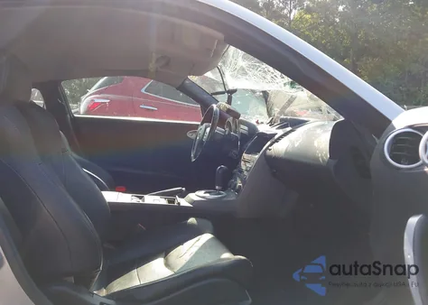 2003 Nissan 350Z Touring z USA, uszkodzony, nr VIN JN1AZ34D43T103694